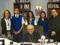 Father Byron with KORAES students & Principal Mary Zaharis